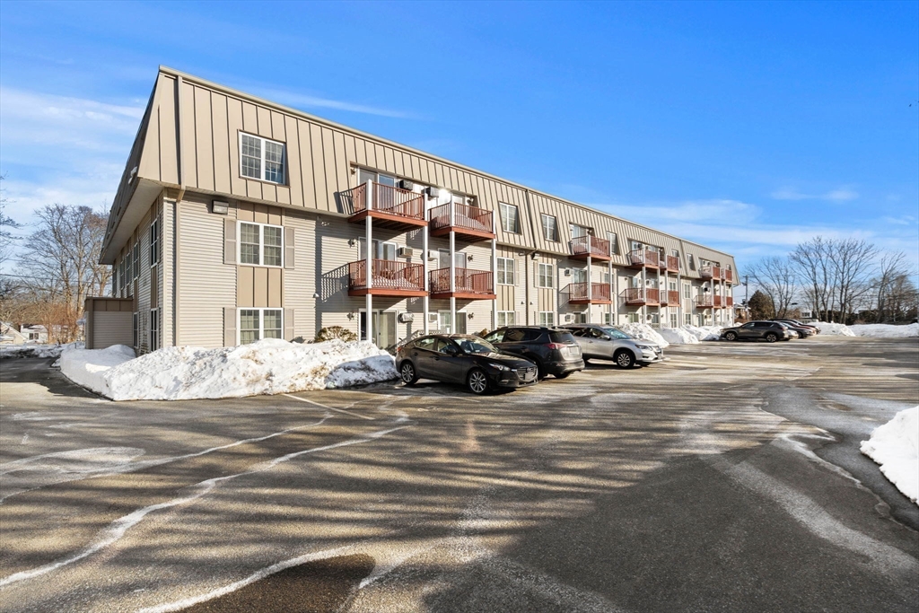 2 Ocean Avenue, Unit 2K Gloucester, MA 01930 - Photo 5 of 26 a view of a street with cars