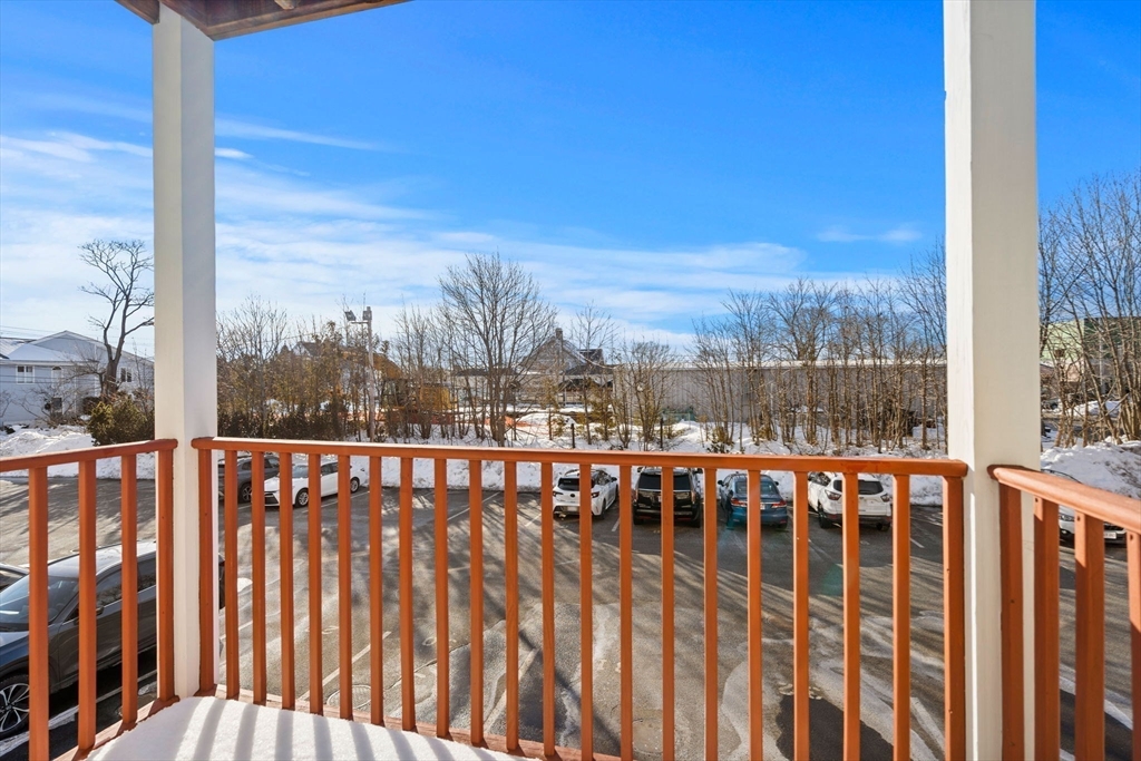 2 Ocean Avenue, Unit 2K Gloucester, MA 01930 - Photo 9 of 26 a view of city from a balcony