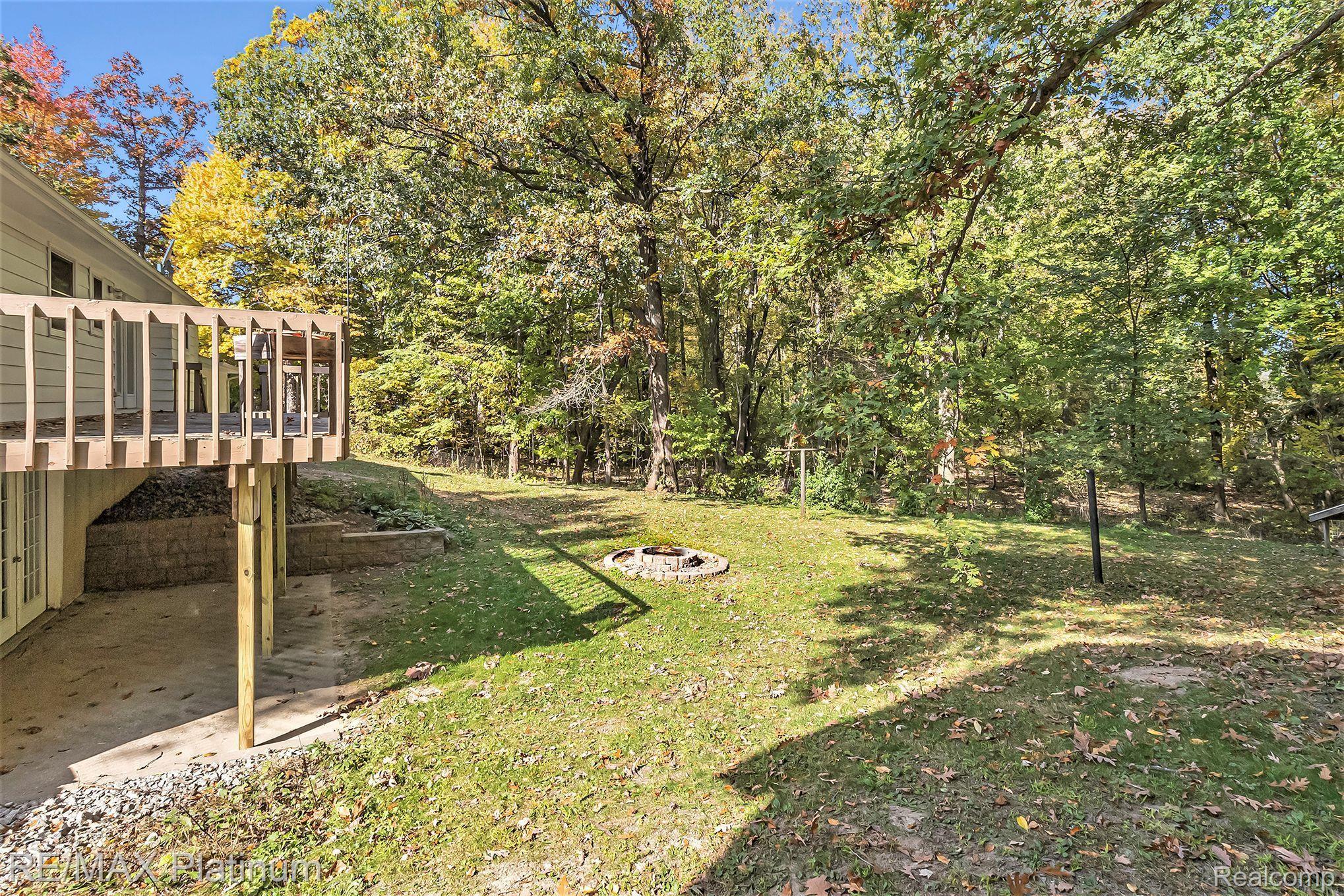 9650 North Fleming Road Fowlerville, MI 48836 - Photo 17 of 21 Back Yard with "fencing"