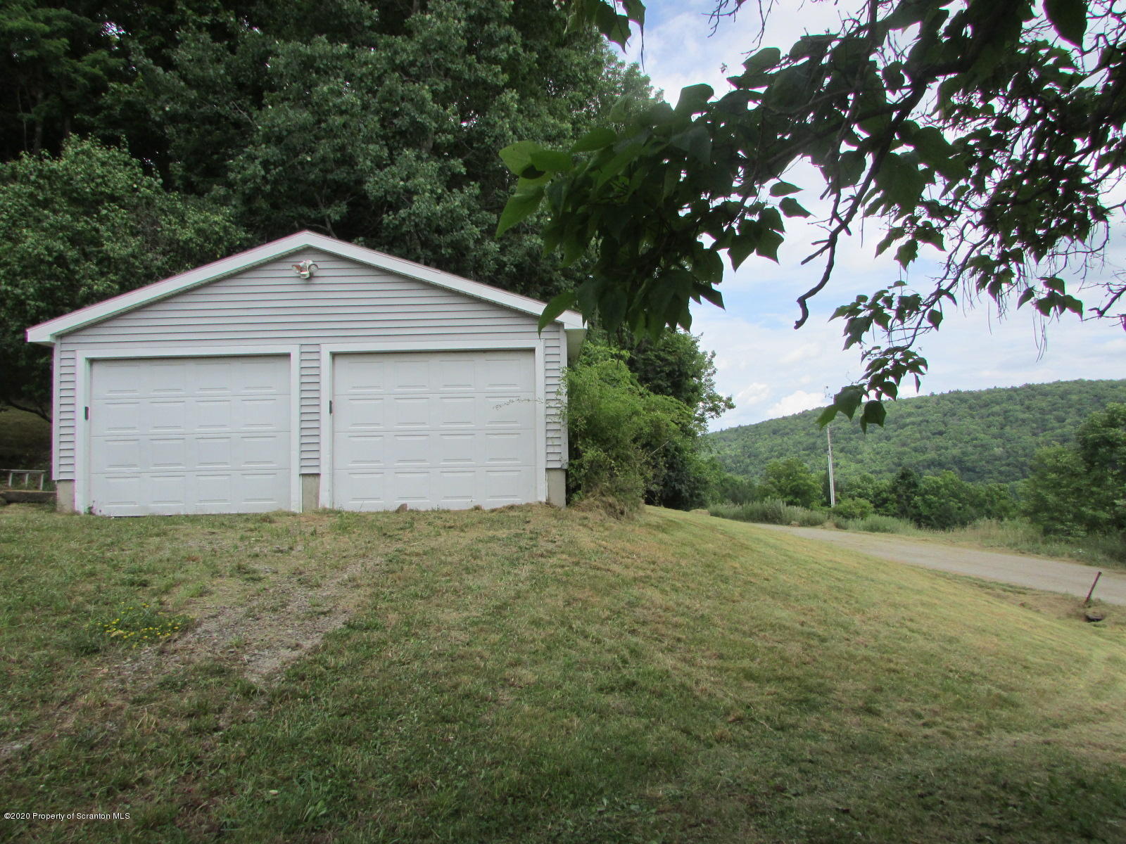 1859 Hunsinger Road Hallstead, PA 18822 - Photo 2 of 19 a view of backyard of house