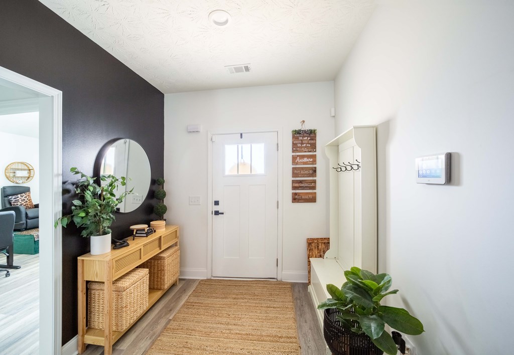 14 Lemon Way Phenix City, AL 36869 - Photo 2 of 13 a view of a hallway to a potted plant