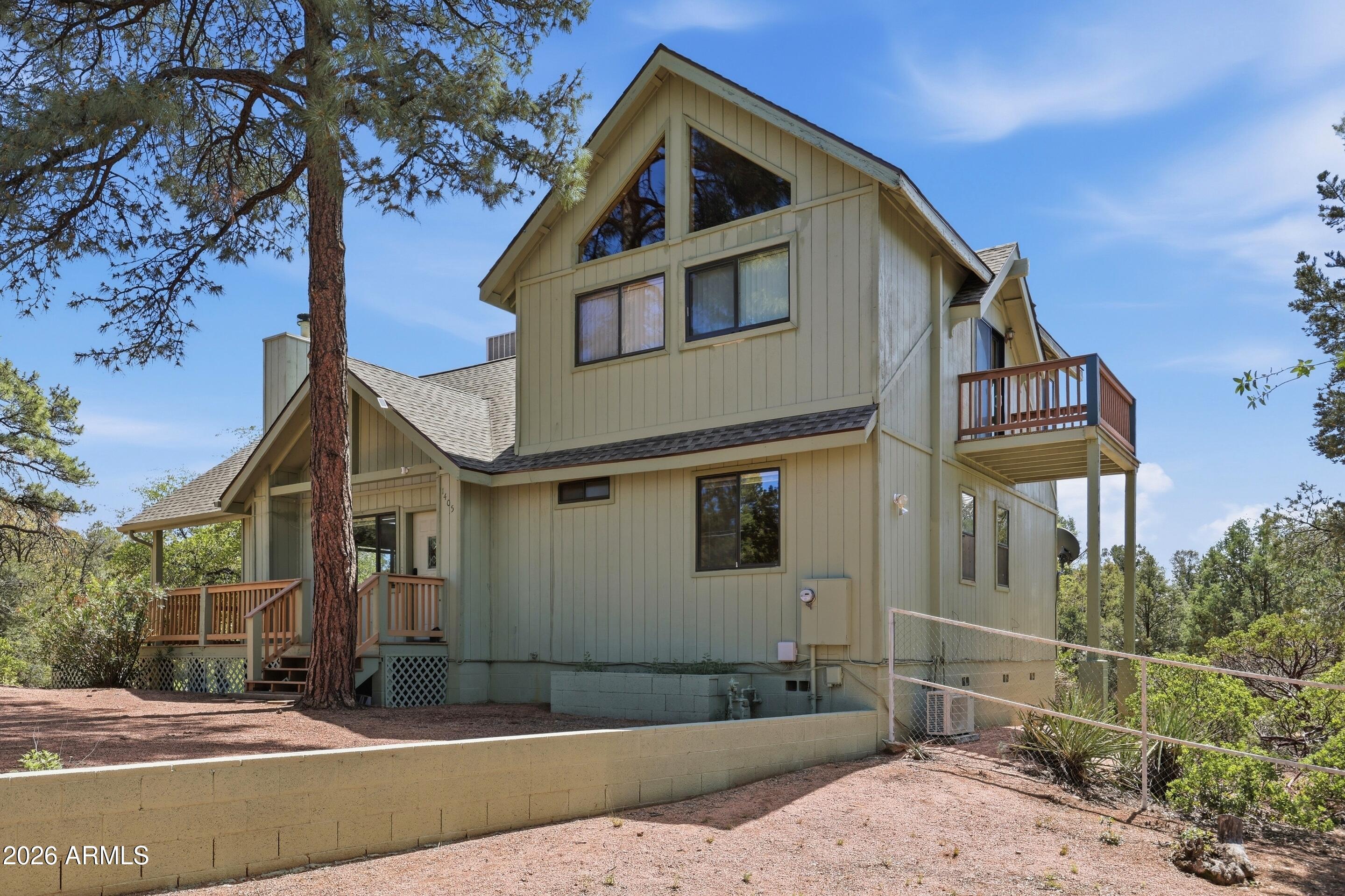 1405 East Graham Rnch Trail Payson, AZ 85541 - Photo 3 of 46 a front view of a house with a yard