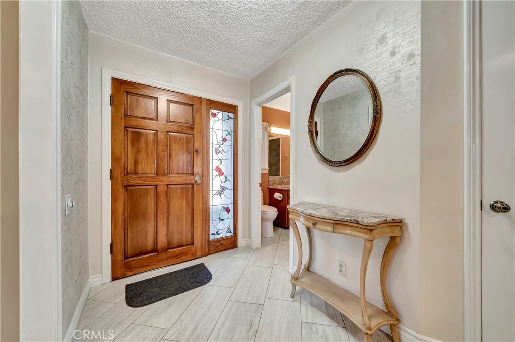 24206 St Edens Circle West Hills, CA 91307 - Photo 24 of 52 a very nice looking room with a large window and mirror