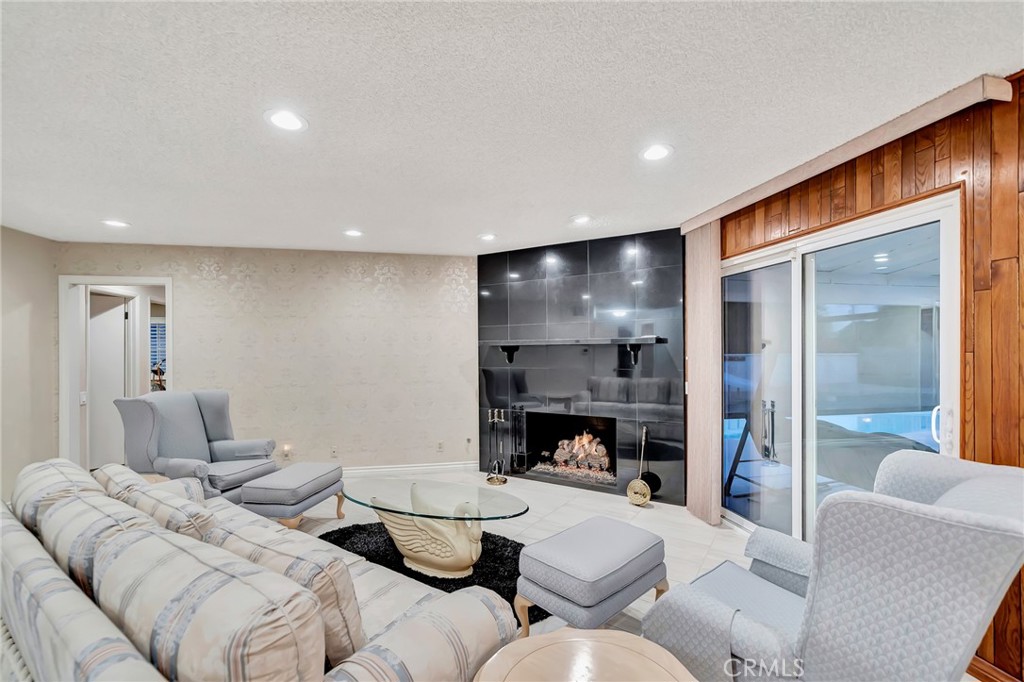 24206 St Edens Circle West Hills, CA 91307 - Photo 26 of 52 a living room with furniture and a fireplace