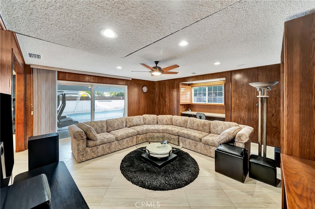 24206 St Edens Circle West Hills, CA 91307 - Photo 34 of 52 a living room with furniture and a large window
