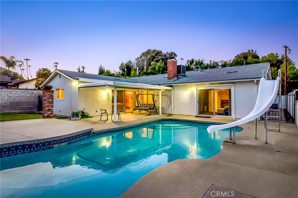 24206 St Edens Circle West Hills, CA 91307 - Photo 4 of 52 a front view of house with swimming pool yard and outdoor seating