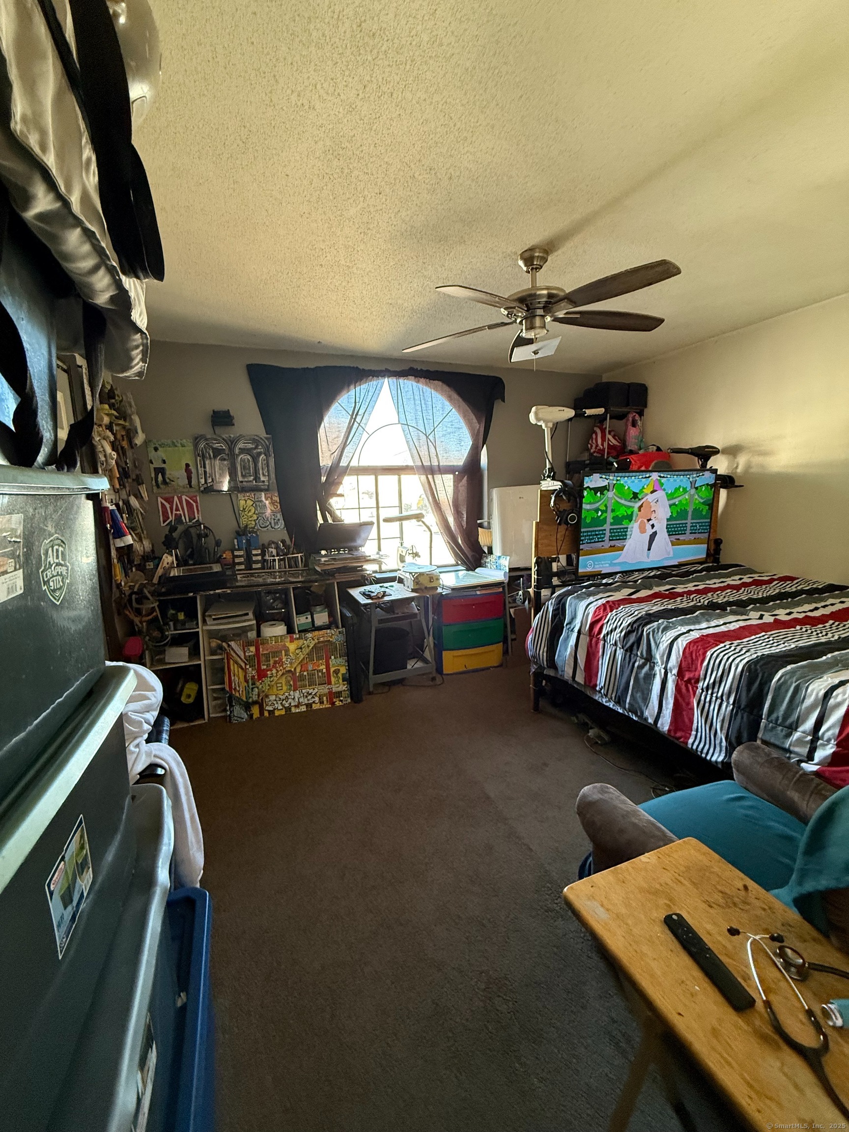 975 Meriden Road, Unit 20 Waterbury, CT 06705 - Photo 3 of 10 a bedroom with furniture and a chandelier