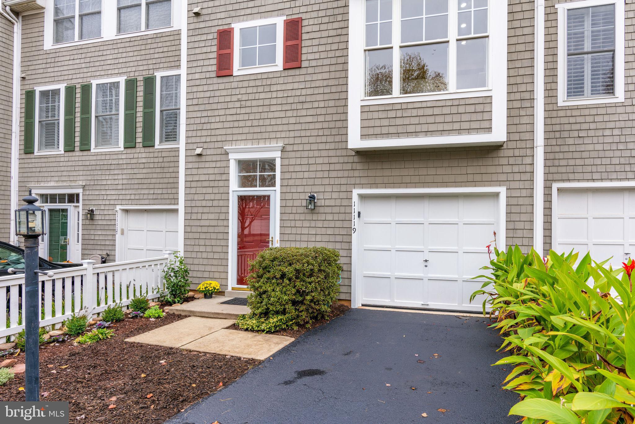 Lovely, easy-maintenance landscaping front & rear.