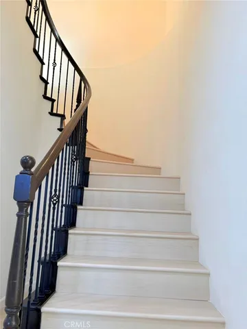 a view of hallway with windows