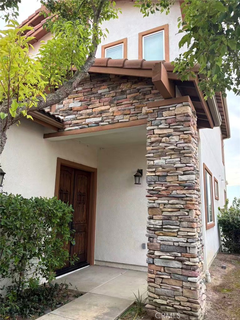 564 Vía Pueblo Riverside, CA 92507 - Photo 2 of 36 a view of a house with a potted plant