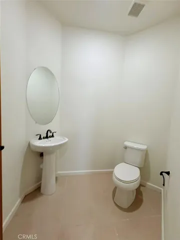 a view of a swimming pool with a lounge chair