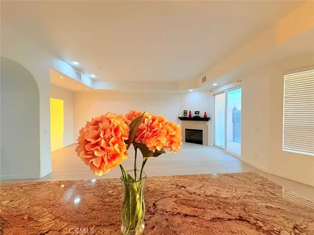 a view of a livingroom with wooden floor