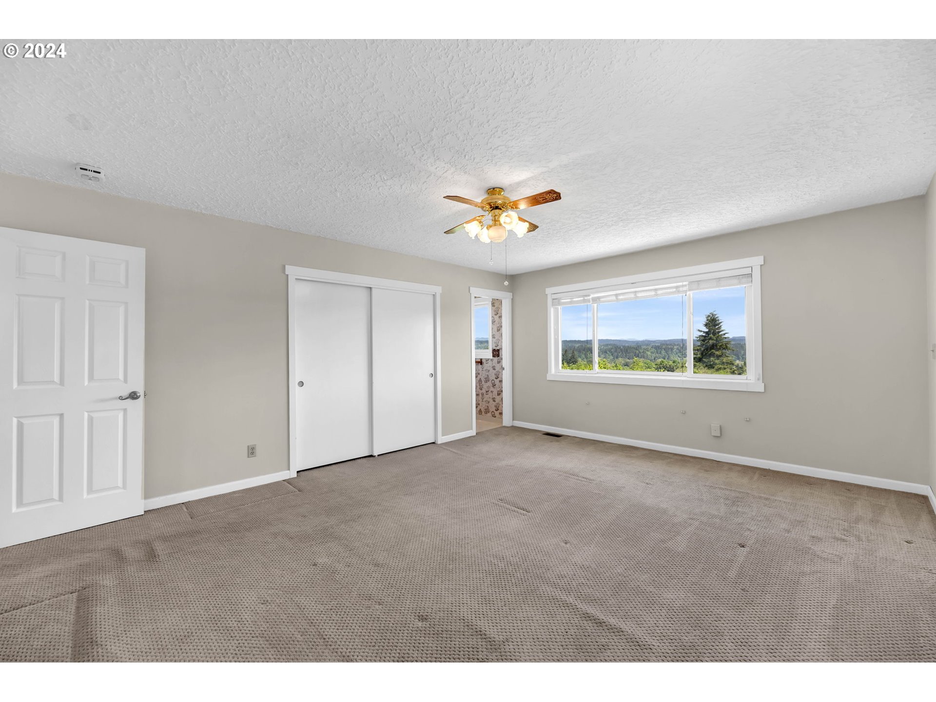 27309 Northeast 29th Avenue Ridgefield, WA 98642 - Photo 21 of 39 a view of an empty room with a window