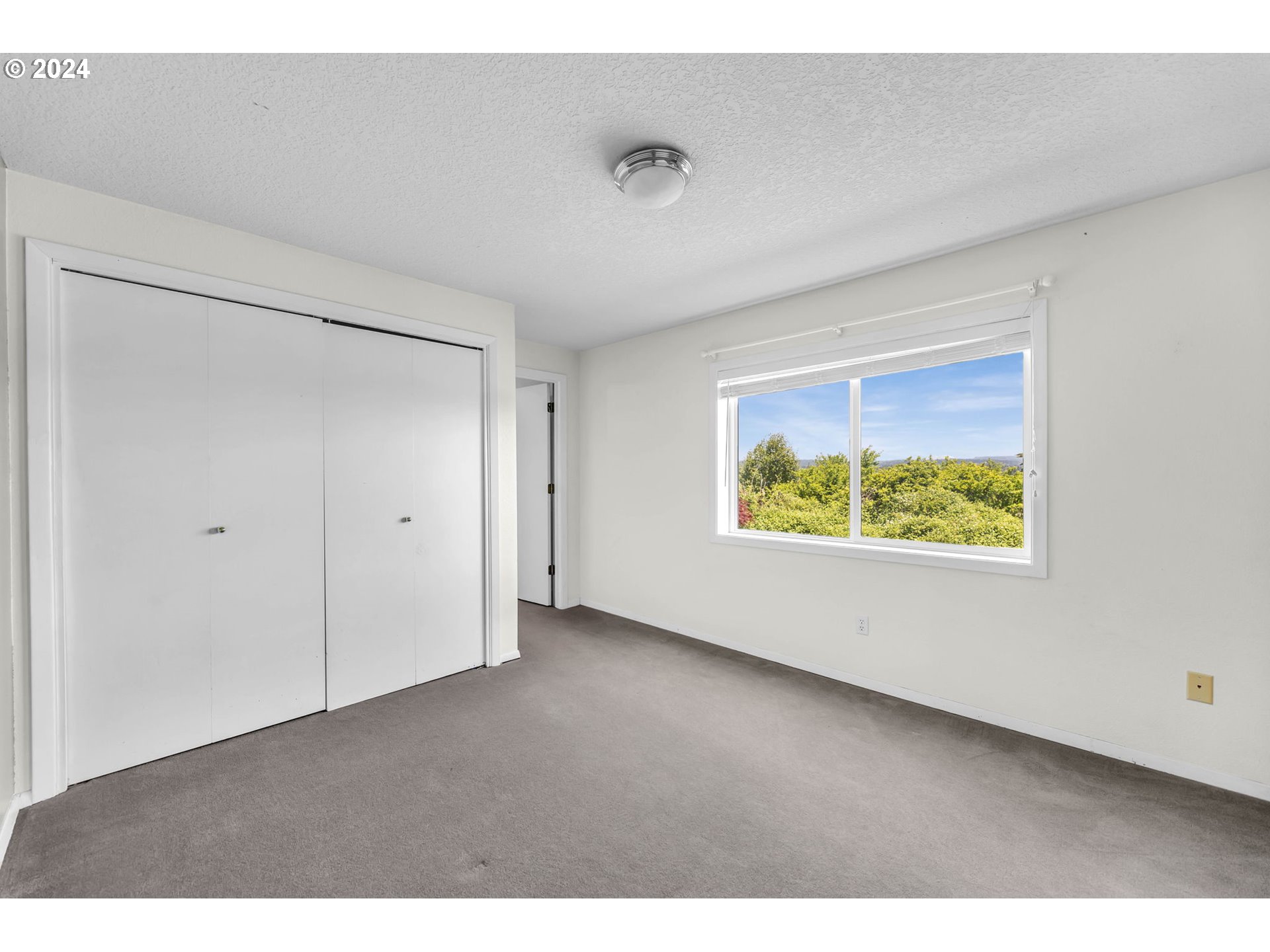 27309 Northeast 29th Avenue Ridgefield, WA 98642 - Photo 26 of 39 a view of an empty room with a window