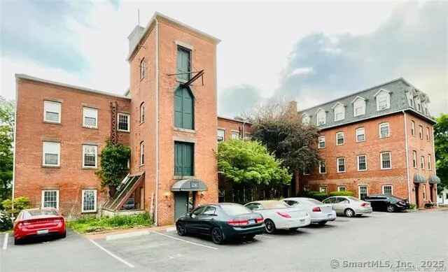 a cars parked in front of a building