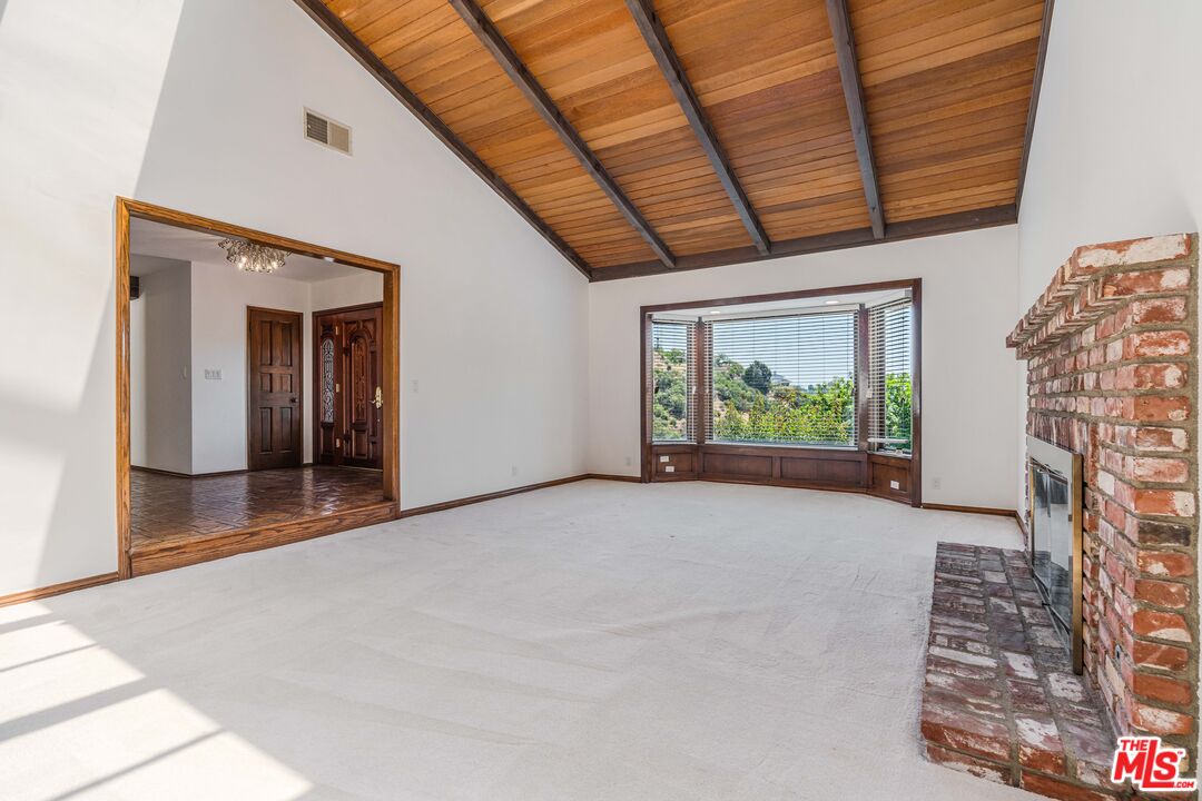 1181 Somera Road Los Angeles, CA 90077 - Photo 4 of 40 a view of livingroom with furniture
