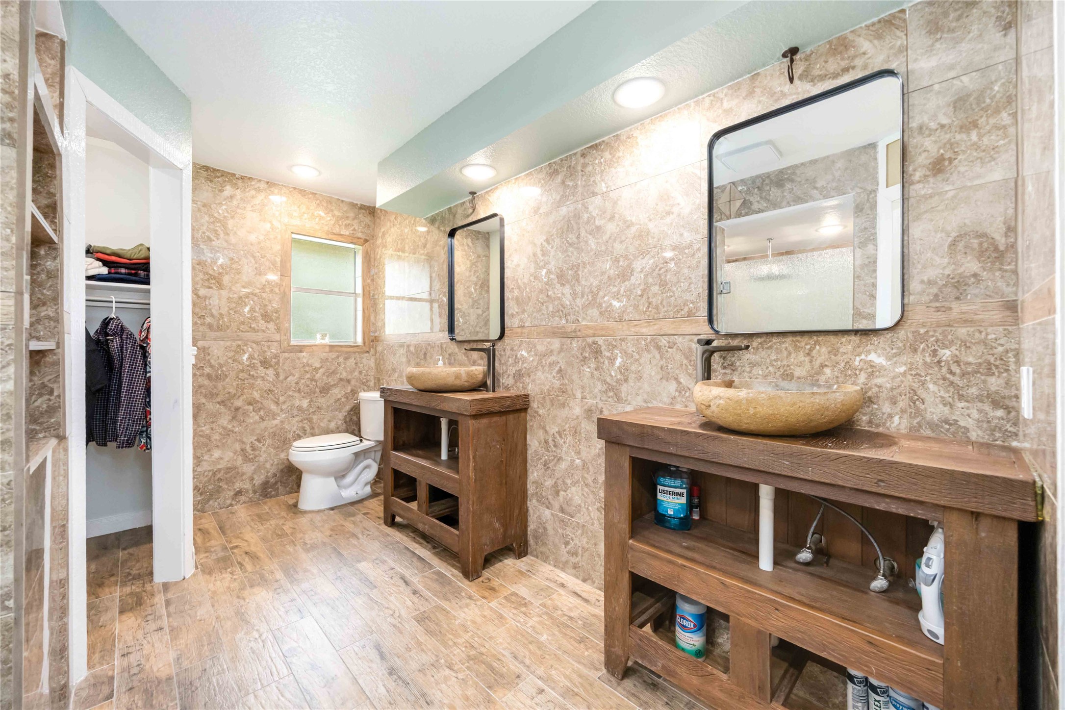 478 Brandon Road Conroe, TX 77302 - Photo 19 of 31 a living room with furniture and a fireplace