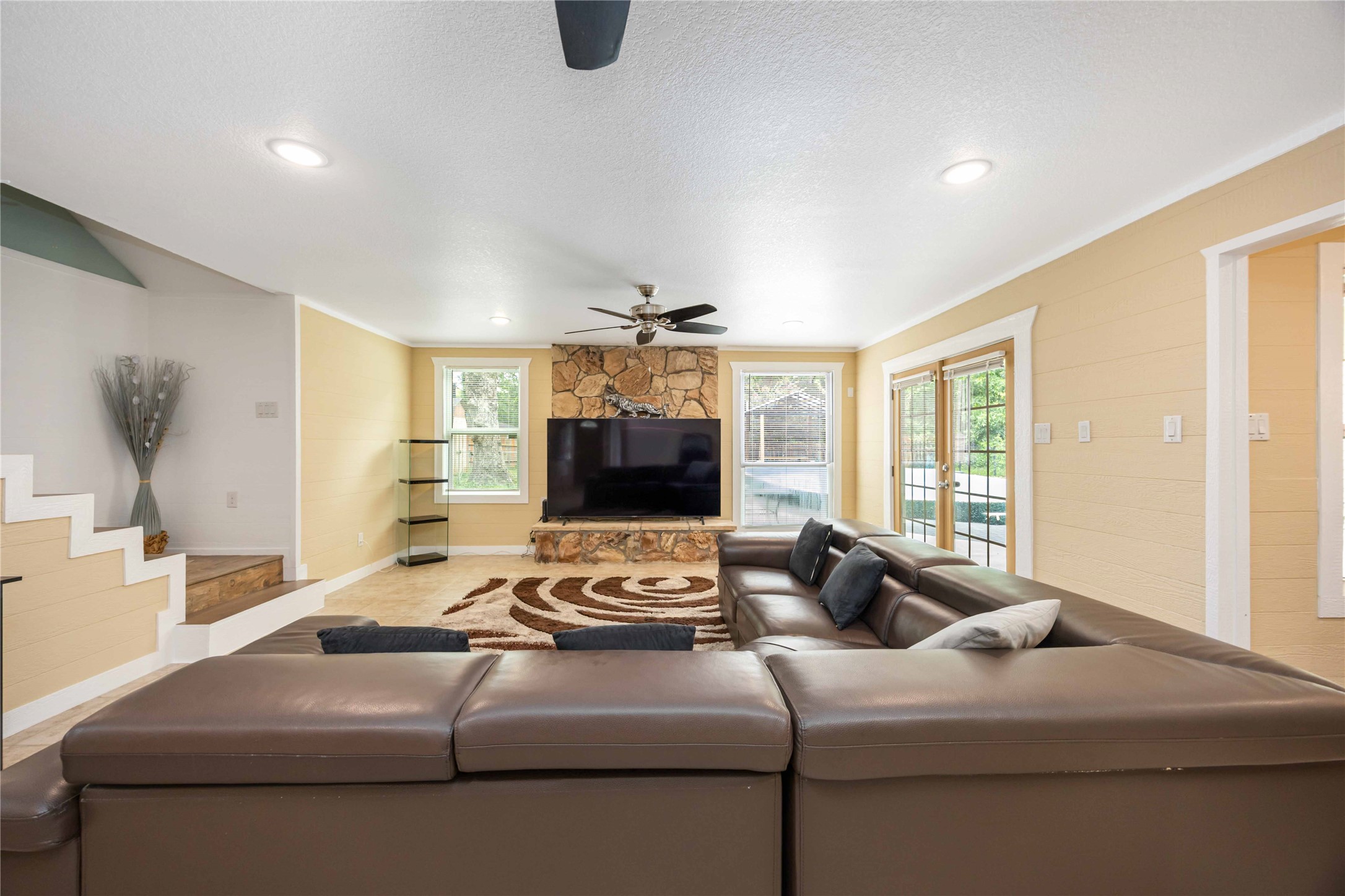 478 Brandon Road Conroe, TX 77302 - Photo 6 of 31 a living room with furniture and a flat screen tv