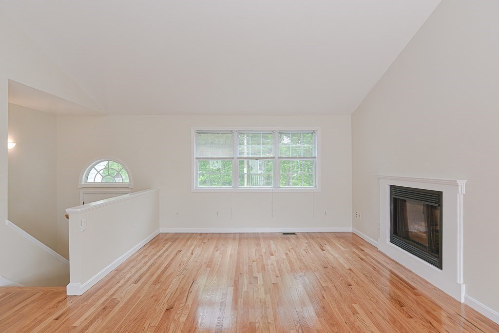 28 Aroostook Street Worcester, MA 01606 - Photo 11 of 40 wooden floor in an empty room with a window