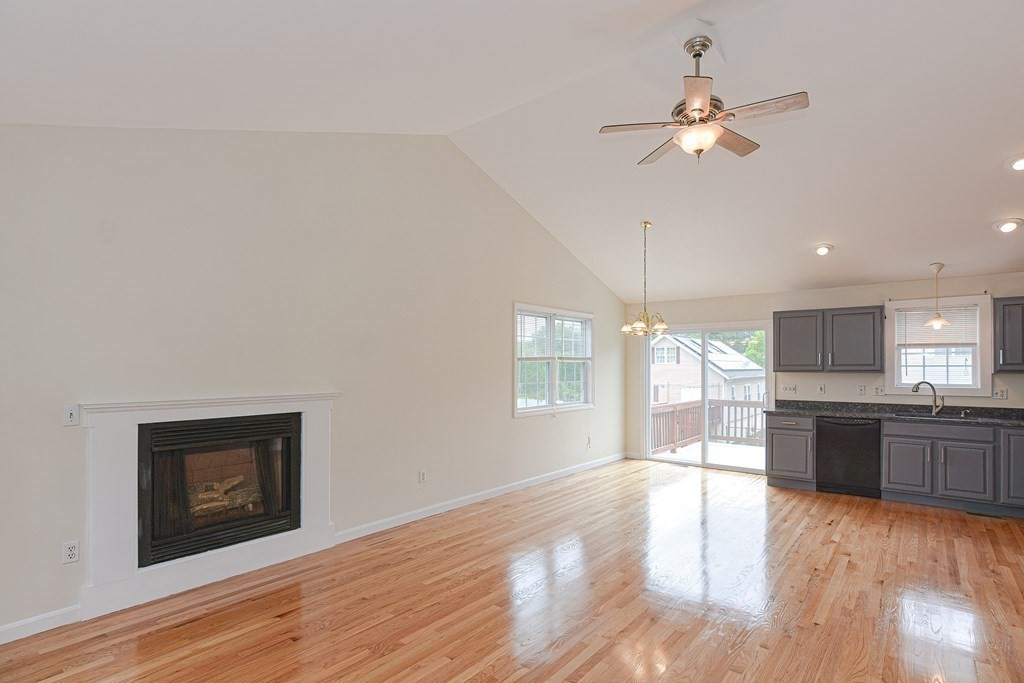 28 Aroostook Street Worcester, MA 01606 - Photo 12 of 40 a large kitchen with cabinets wooden floor and stainless steel appliances