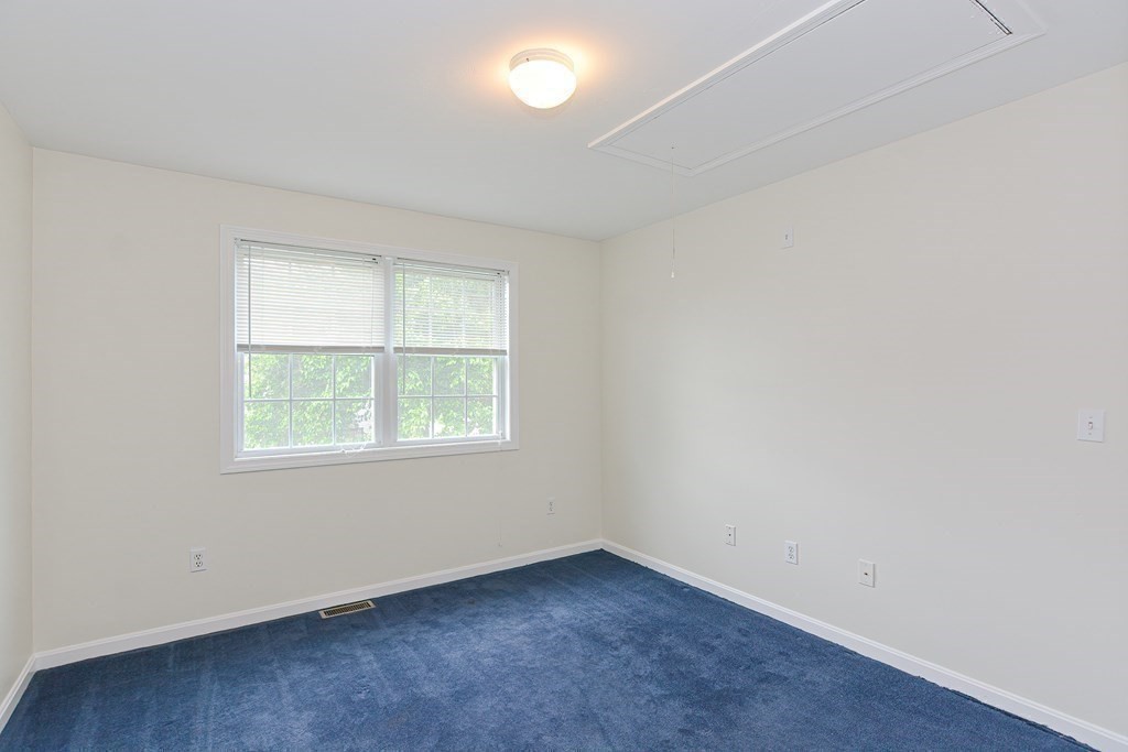28 Aroostook Street Worcester, MA 01606 - Photo 28 of 40 an empty room with a window
