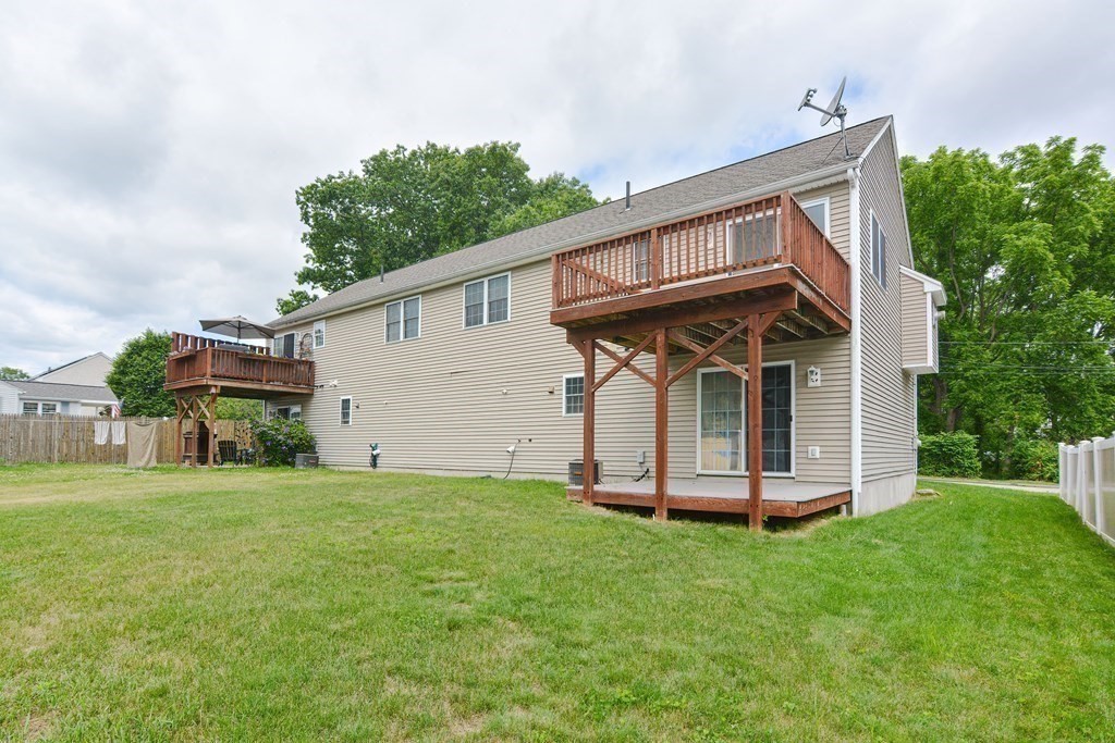 28 Aroostook Street Worcester, MA 01606 - Photo 32 of 40 a front view of a house with a yard