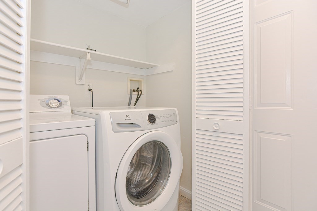 28 Aroostook Street Worcester, MA 01606 - Photo 37 of 40 a utility room with dryer and washer