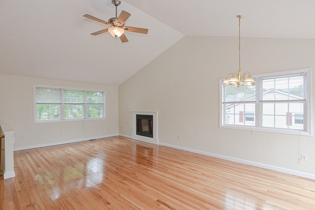 28 Aroostook Street Worcester, MA 01606 - Photo 10 of 40 a view of an empty room with wooden floor and a window