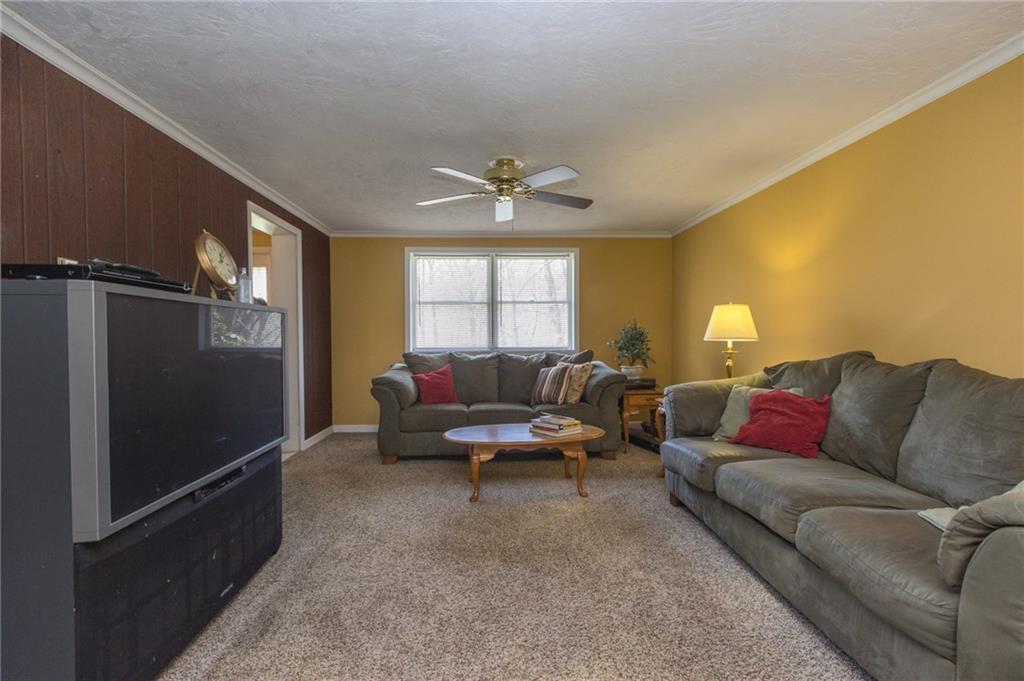 126 Temple Road Monaca, PA 15061 - Photo 14 of 22 Family room with large picture window and newer carpeting.