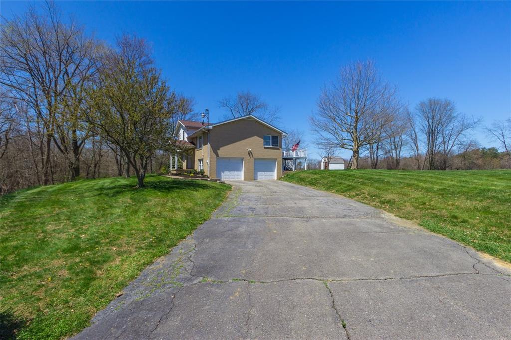 126 Temple Road Monaca, PA 15061 - Photo 21 of 22 Side entrance to double car garage with remotes.