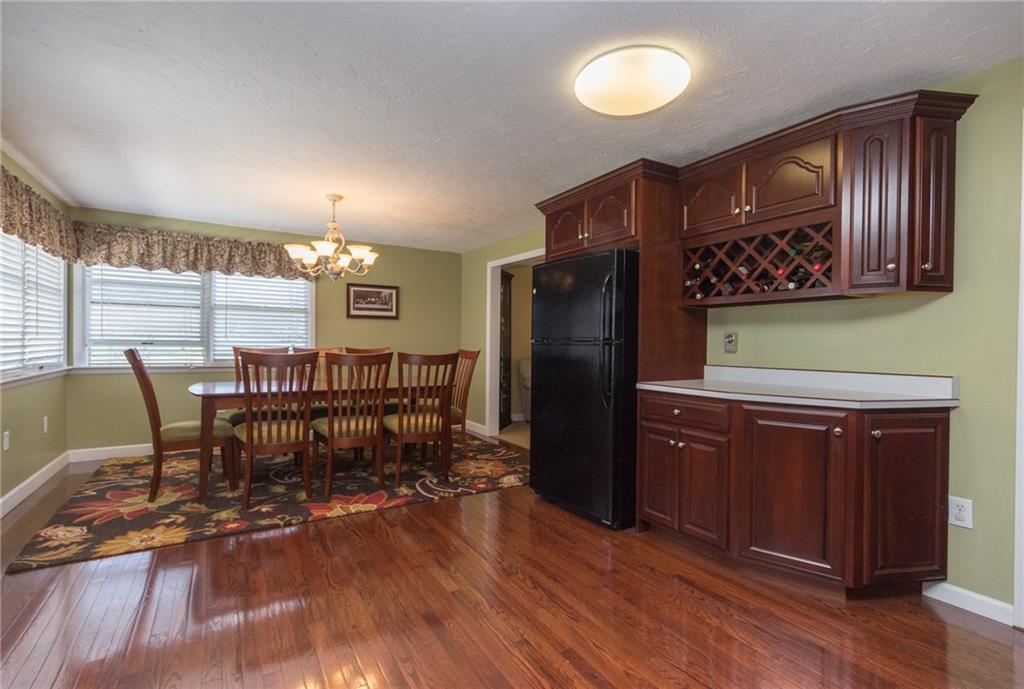 126 Temple Road Monaca, PA 15061 - Photo 5 of 22 Dining area with corner window for lots of natural light. Built in wine rack!
