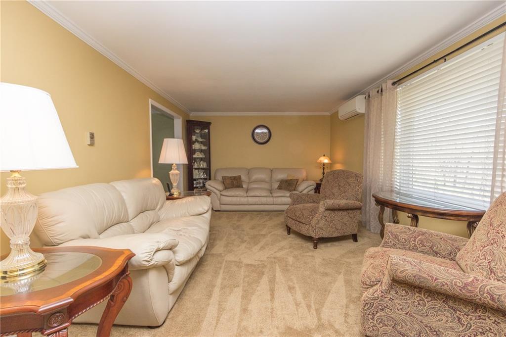 126 Temple Road Monaca, PA 15061 - Photo 7 of 22 Living room with new carpeting.