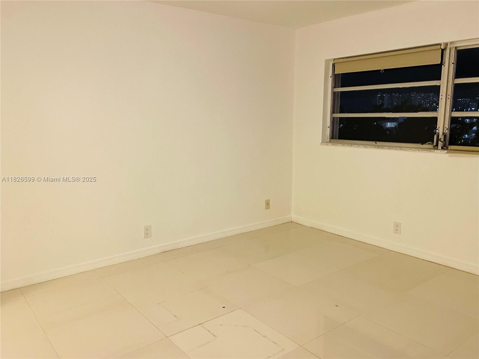 180 Northeast 12th Avenue, Unit 11E Hallandale Beach, FL 33009 - Photo 13 of 22 a view of an empty room