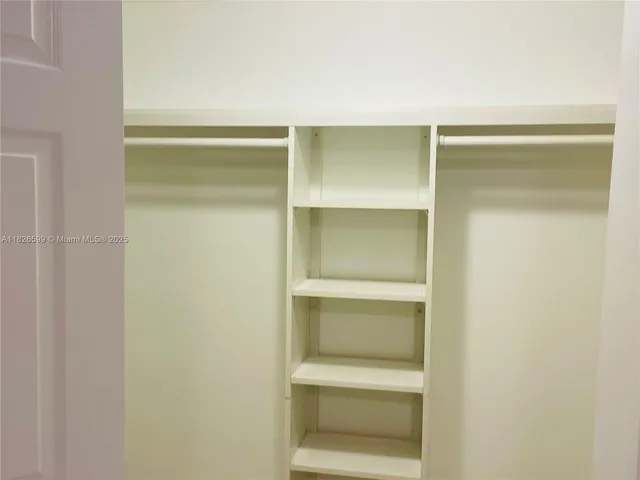 a hallway with closet