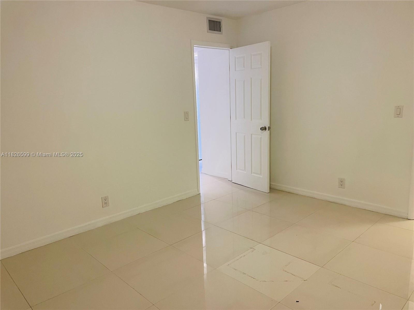 180 Northeast 12th Avenue, Unit 11E Hallandale Beach, FL 33009 - Photo 16 of 22 a view of an empty room