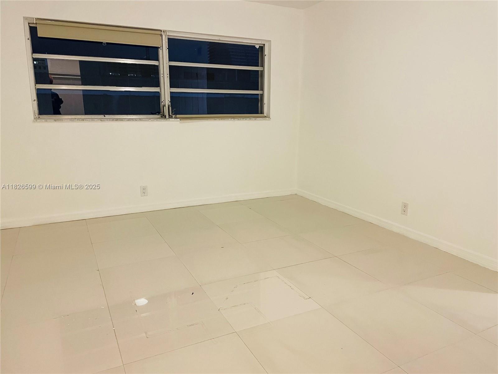180 Northeast 12th Avenue, Unit 11E Hallandale Beach, FL 33009 - Photo 17 of 22 a view of an empty room