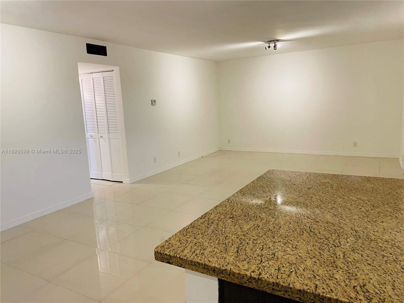 180 Northeast 12th Avenue, Unit 11E Hallandale Beach, FL 33009 - Photo 5 of 22 wooden floor in a bathroom