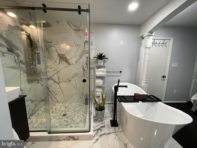 a bathroom with a sink and mirror