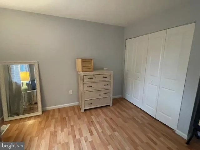 a view of room with hardwood floor