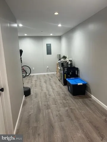 a room with furniture and gym equipment