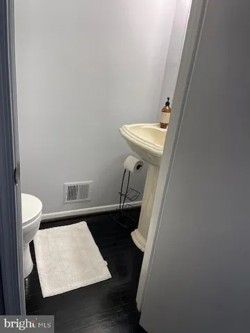 a bathroom with a sink and a toilet