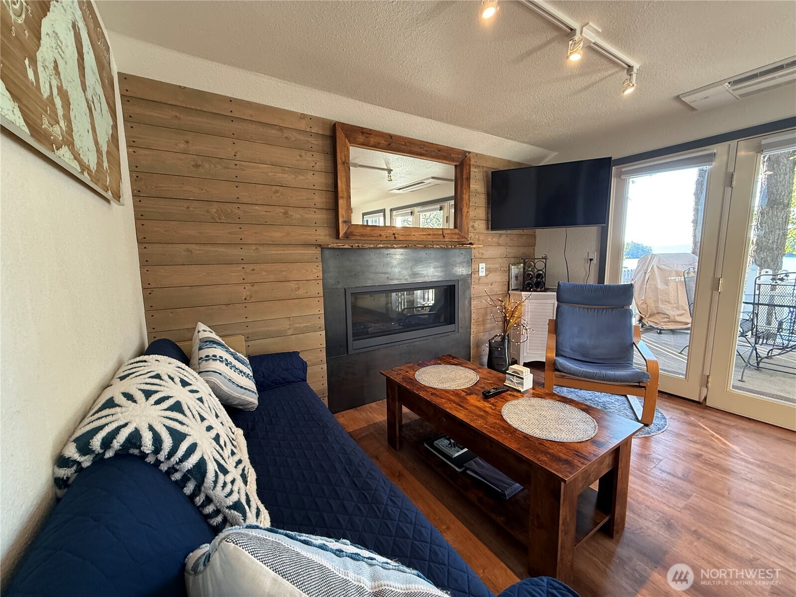 5244 Deer Harbor Road Orcas Island, WA 98243 - Photo 23 of 38 a living room with furniture and a fireplace