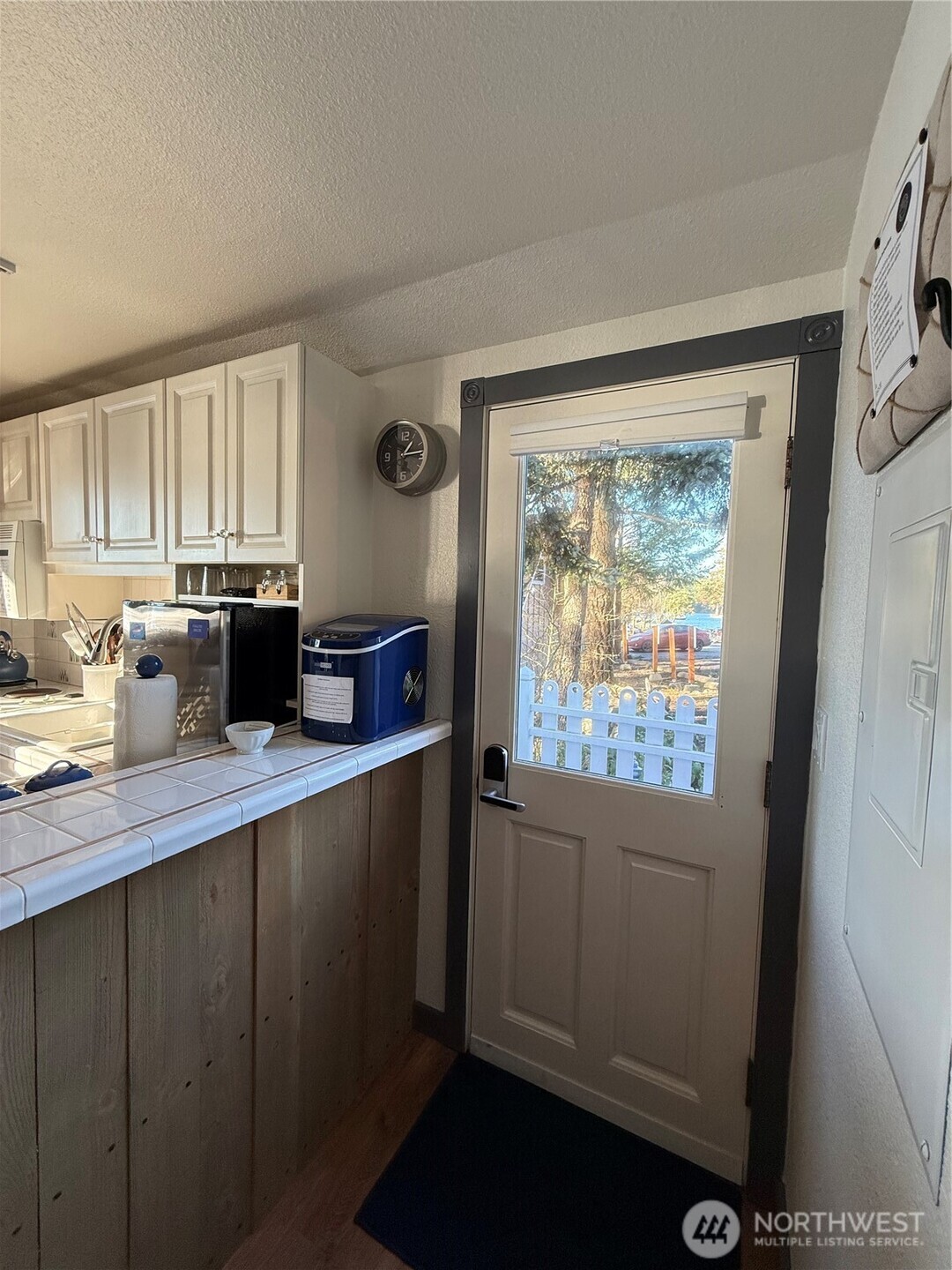 5244 Deer Harbor Road Orcas Island, WA 98243 - Photo 28 of 38 a kitchen with stainless steel appliances a counter top space sink and window