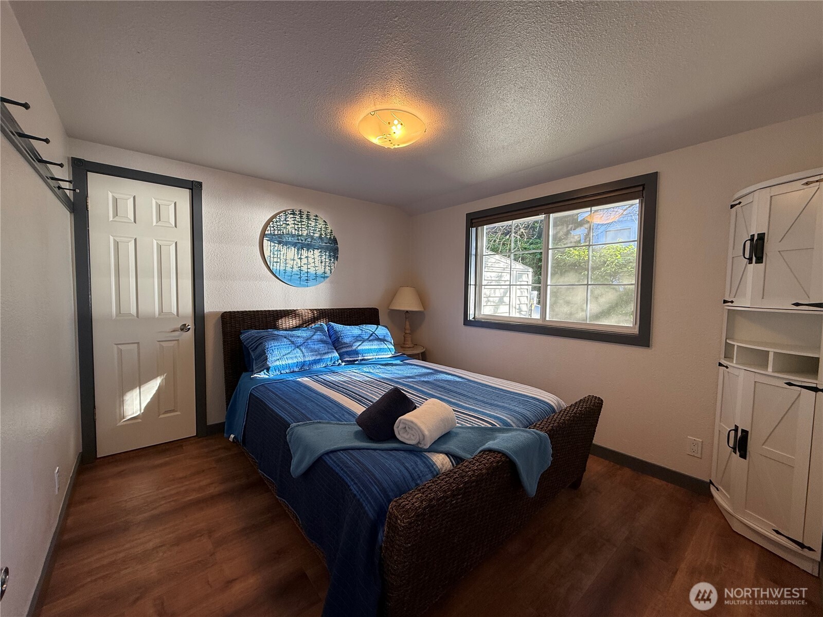5244 Deer Harbor Road Orcas Island, WA 98243 - Photo 31 of 38 a bed room with a bed and a window