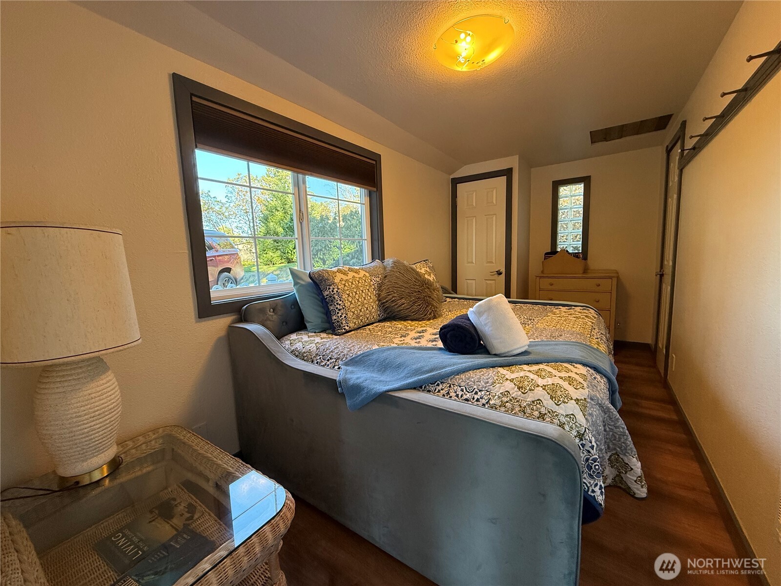 5244 Deer Harbor Road Orcas Island, WA 98243 - Photo 33 of 38 a bedroom with a bed and window