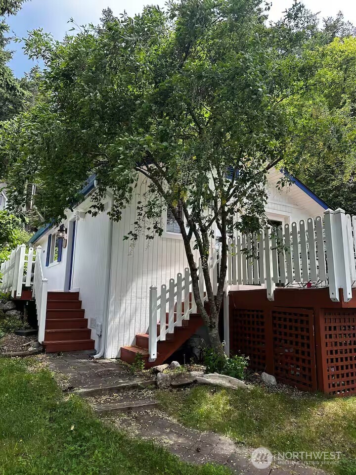 5244 Deer Harbor Road Orcas Island, WA 98243 - Photo 8 of 38 front view of a house with a yard