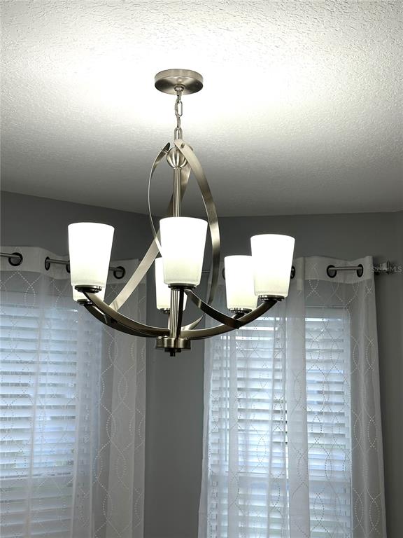 9706 Southwest 92nd Place Road Ocala, FL 34481 - Photo 26 of 82 a bathroom with a light fixture and a sink