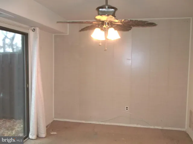 a view of a chandelier in big room