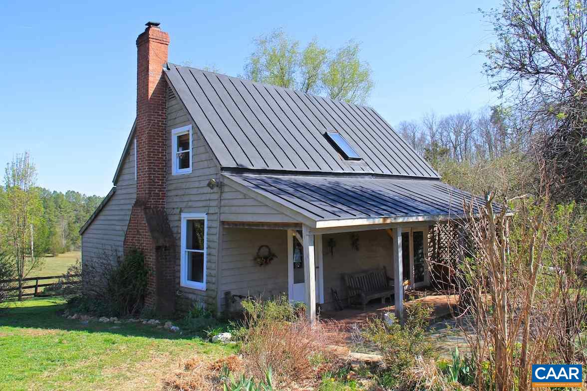 7814 Chestnut Grove Road Esmont, VA 22937 - Photo 1 of 28 front view of a house with a yard