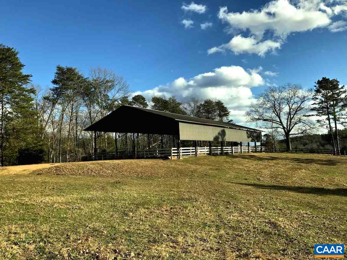 7814 Chestnut Grove Road Esmont, VA 22937 - Photo 15 of 28 a front view of house with yard and trees